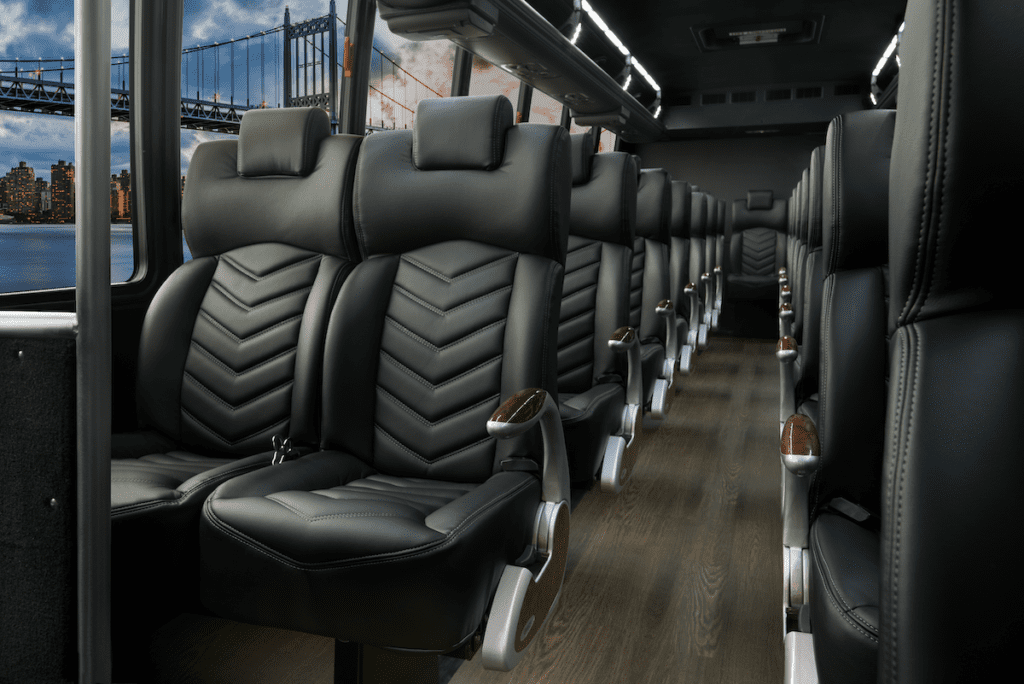 tcs canada charter bus interior - comfortable black leather seats