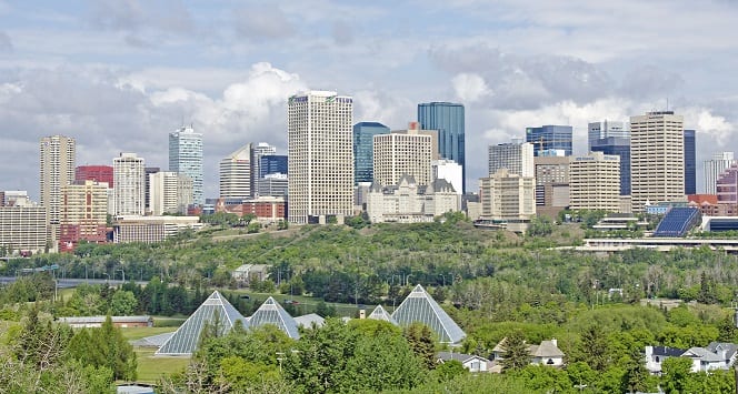 Edmonton Skyline and the greenhouse pyramids of the Muttart Conservatory. This photo is taken across the the North Saskatchawan River and looking north into the center of the downtown area.